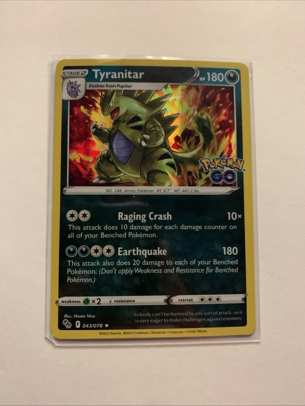 Pokemon Tyranitar Trading Card - Yellow and Green